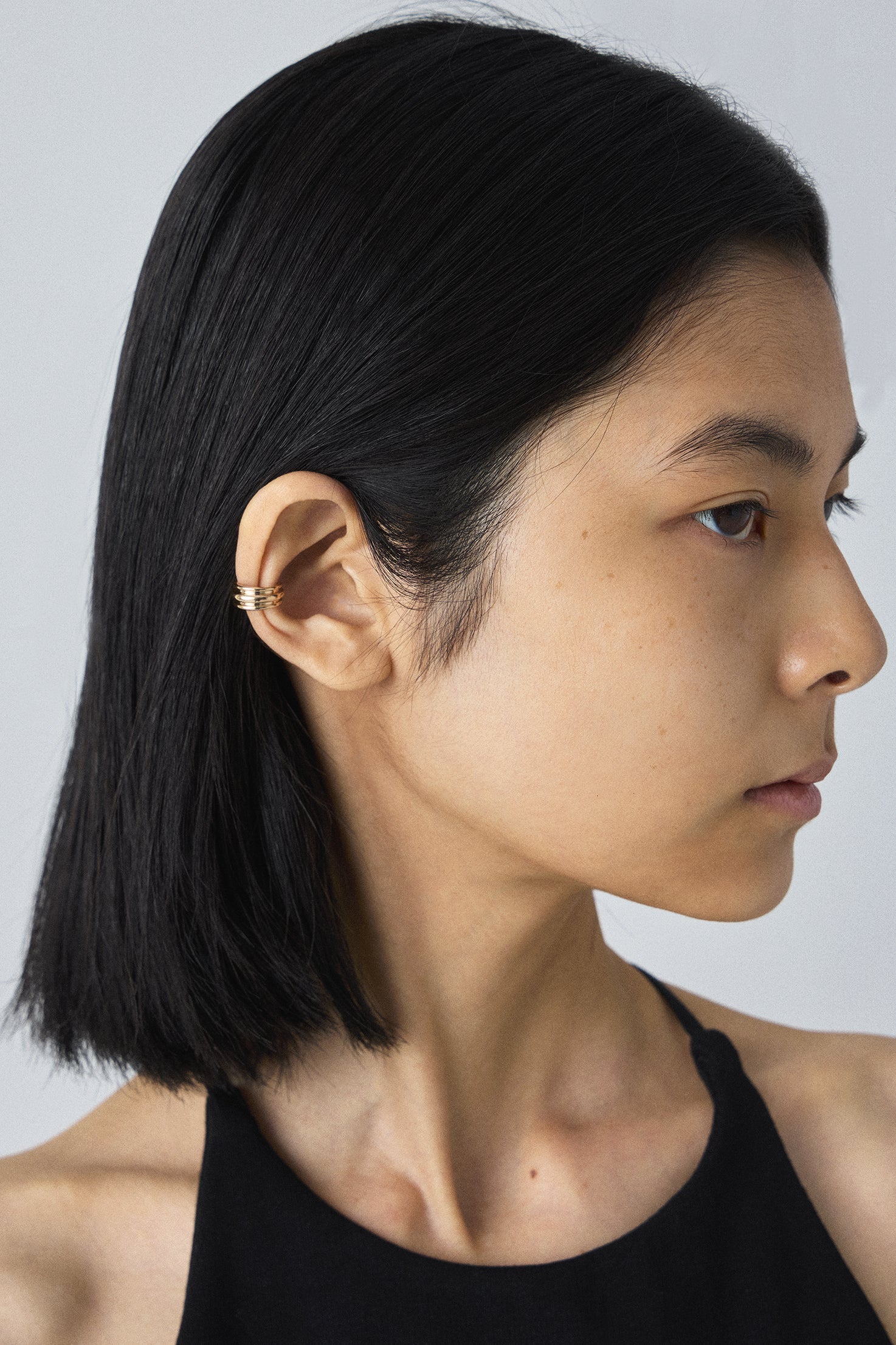 10K GOLD FLAT POTTERY VESSEL EAR CUFF