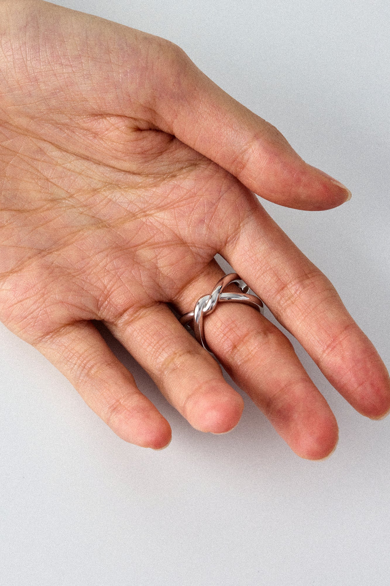 COLD WHITE AND SILVER QUADRUPLE OPEN RING