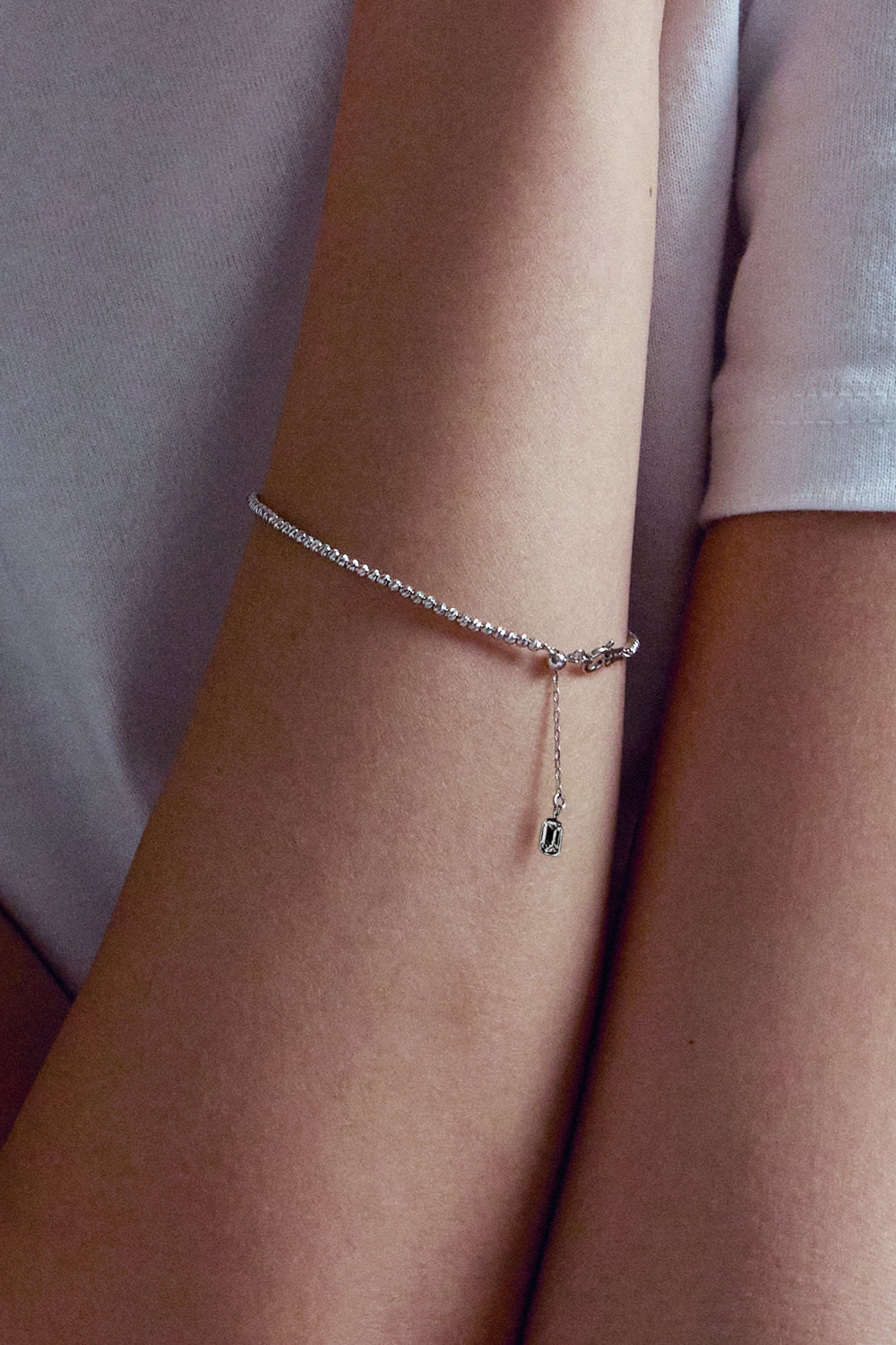 FACETED BALL CHAIN BRACELET IN WHITE GOLD