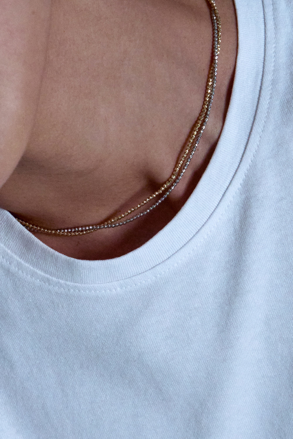 FACETED BALL CHAIN NECKLACE IN GOLD